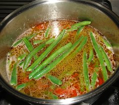 Step 3: Add enough water to cover the beans and potatoes.