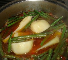 Step 4: When the beans begin to change colour add the potatoes which have been cut into quarters. …