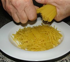 Step 5: If using thin spaghetti, break it up for spoon size pieces and cook separately in salted w…
